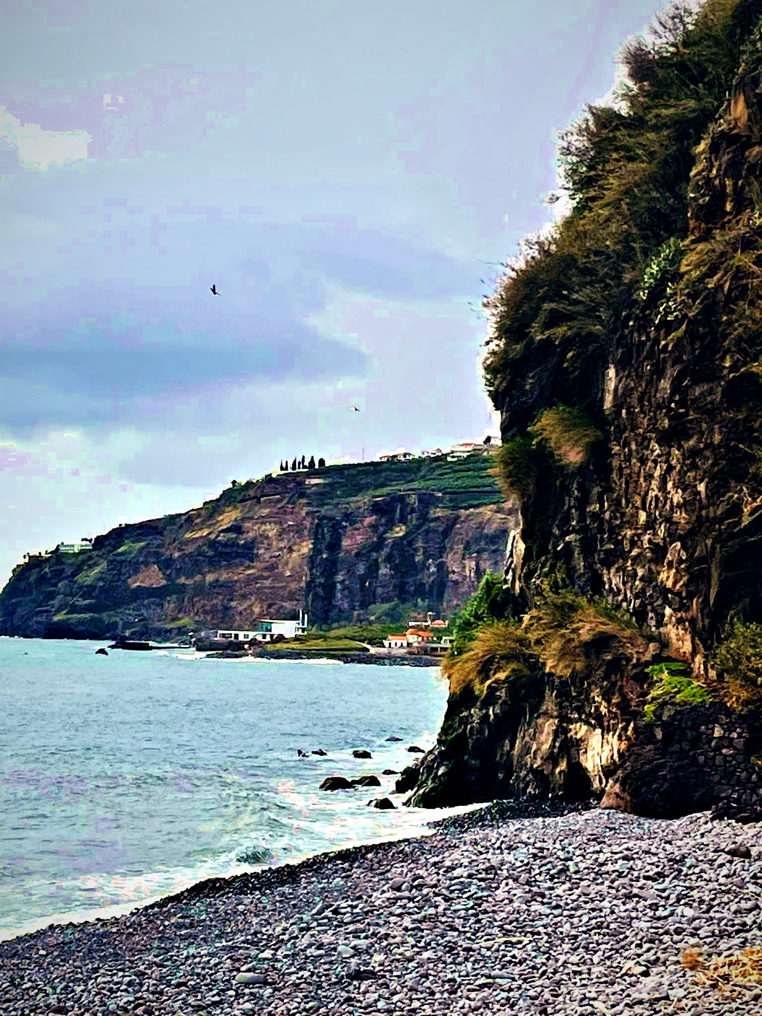 Pebble beach below the AETHER cliffs